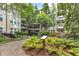 Courtyard features a pond, walking path, and lush landscaping at 1850 Cotillion Dr # 3123, Atlanta, GA 30338