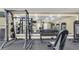 Weight room featuring weightlifting machines and dumbbells, providing a complete fitness experience at 1850 Cotillion Dr # 3123, Atlanta, GA 30338
