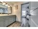Bathroom featuring double sink vanity and doorway to bedroom at 236 Barfield Sw Ave, Atlanta, GA 30310