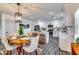 Beautiful kitchen with stainless appliances, breakfast bar and open dining area concept at 236 Barfield Sw Ave, Atlanta, GA 30310
