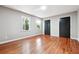 Bright bedroom with hardwood flooring and windows to let the sunshine in at 4617 Cedar Park Dr, Stone Mountain, GA 30083