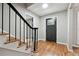 Foyer showcases hardwood floors, modern lighting, and a view of the front door at 4617 Cedar Park Dr, Stone Mountain, GA 30083