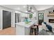 Bright kitchen with stainless appliances, white cabinetry, and island seating at 4617 Cedar Park Dr, Stone Mountain, GA 30083