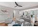 Inviting living area with hardwood floors and seamless transition to the dining room at 4617 Cedar Park Dr, Stone Mountain, GA 30083