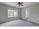 Bedroom with carpet flooring and ceiling fan at 112 Lexington Parke Dr, Woodstock, GA 30189