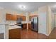 Well-equipped kitchen with stainless steel appliances, ample cabinet space, and quartz countertops at 257 Ridge Mill Dr, Acworth, GA 30102