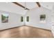 Spacious bedroom with natural light, hardwood floors, and vaulted ceilings at 504 Barrington Drive, Roswell, GA 30075