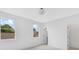 Bright bedroom with neutral walls, trim, carpet, and windows offering neighborhood views at 504 Barrington Drive, Roswell, GA 30075