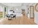 Bright dining room with an open concept and seamless flow to the living area at 504 Barrington Drive, Roswell, GA 30075