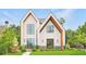 Stunning two-story home with a modern design, featuring black trim windows and a well-maintained lawn at 504 Barrington Drive, Roswell, GA 30075