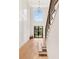 Grand foyer with soaring ceilings, light hardwood floors, and an elegant staircase at 504 Barrington Drive, Roswell, GA 30075