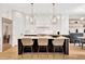 Bright kitchen with white cabinetry, stainless steel appliances, and a large center island at 504 Barrington Drive, Roswell, GA 30075