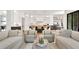 Open-concept living room featuring a kitchen and adjacent dining area at 504 Barrington Drive, Roswell, GA 30075