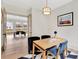 Bright office space with wood desk, modern chairs, black and white rug and ample natural light at 504 Barrington Drive, Roswell, GA 30075