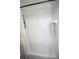 A clean and white bathtub and shower combination with white tiles at 10 Stagg Trce, Social Circle, GA 30025