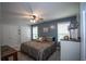 A cozy bedroom with neutral walls, comfortable bedding, and ample closet space for storage at 10 Stagg Trce, Social Circle, GA 30025