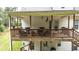 Spacious elevated deck, perfect for entertaining or relaxing with views of the private backyard and mature trees at 10 Stagg Trce, Social Circle, GA 30025