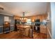 Charming kitchen with wood cabinets, stainless steel appliances, and a center island with bar seating at 10 Stagg Trce, Social Circle, GA 30025