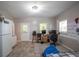 A versatile living space with room for work and play. Has fridge and door to outside at 10 Stagg Trce, Social Circle, GA 30025