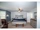 A spacious main bedroom featuring neutral walls, and ample natural light at 10 Stagg Trce, Social Circle, GA 30025