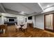 Spacious finished basement features hardwood floors, entertainment area, and a modern aesthetic at 1038 Saint Charles Ave, Atlanta, GA 30306