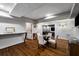 Finished basement includes a dining area, lounge, and entertainment space at 1038 Saint Charles Ave, Atlanta, GA 30306