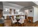 Basement with dining area, kitchenette, and wood floors at 1038 Saint Charles Ave, Atlanta, GA 30306