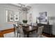 Elegant dining room featuring a modern chandelier and stylish decor at 1038 Saint Charles Ave, Atlanta, GA 30306