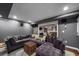 Entertainment room featuring large sectional sofa and view of kitchen at 1038 Saint Charles Ave, Atlanta, GA 30306