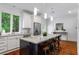 Eat-in kitchen with large island, granite countertops, and stainless steel appliances at 1038 Saint Charles Ave, Atlanta, GA 30306
