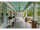 Spacious front porch with ample seating, perfect for enjoying the outdoors at 1038 Saint Charles Ave, Atlanta, GA 30306
