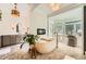 Luxurious bathroom featuring a freestanding tub, a chandelier, and views from a bay window at 111 Cherry Hill Dr, Marietta, GA 30067