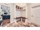 Inviting entryway with built-in bench, storage, and tiled floor at 111 Cherry Hill Dr, Marietta, GA 30067