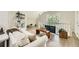 Upstairs loft area featuring hardwood floors and a cozy seating area at 111 Cherry Hill Dr, Marietta, GA 30067