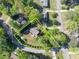 A beautiful house with a large yard surrounded by mature trees and landscaping at 1647 Grandeus Sw Ln, Stone Mountain, GA 30087