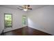 Bright bedroom with crown molding, hardwood floors, and windows at 2001 Mclain Nw Rd, Acworth, GA 30101