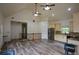 Spacious kitchen with stainless steel appliances, wood floors, and ample counter space for cooking and entertaining at 2001 Mclain Nw Rd, Acworth, GA 30101