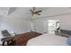 A spacious main bedroom featuring hardwood floors and a doorway to the attached main bathroom at 2001 Mclain Nw Rd, Acworth, GA 30101