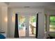 Main bedroom French doors lead to a private patio and backyard with views of green space at 2001 Mclain Nw Rd, Acworth, GA 30101