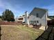 Fenced backyard featuring a wood deck, patio, and grass area, great for families at 3889 Sidney Lanier Blvd, Duluth, GA 30096