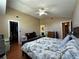 Large main bedroom with vaulted ceiling, fan, generous closet space and adjoining bath at 3889 Sidney Lanier Blvd, Duluth, GA 30096