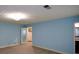 Large carpeted bedroom features a walk-in closet and overhead lighting at 4766 Jamerson Forest Cir, Marietta, GA 30066