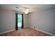 Bedroom featuring carpet, a window, and a ceiling fan at 4766 Jamerson Forest Cir, Marietta, GA 30066