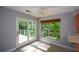 Breakfast nook boasts beautiful natural light and access to the deck at 4766 Jamerson Forest Cir, Marietta, GA 30066
