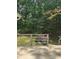 A cozy deck is seen showcasing the natural setting and landscaping at 4766 Jamerson Forest Cir, Marietta, GA 30066