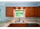 Kitchen featuring stainless appliances, granite counters, and a garden view at 4766 Jamerson Forest Cir, Marietta, GA 30066