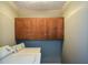 Laundry room with washer, dryer, and wood cabinets at 4766 Jamerson Forest Cir, Marietta, GA 30066