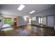 Expansive living room with skylights and multi-tone tile flooring offers ample natural light at 4766 Jamerson Forest Cir, Marietta, GA 30066