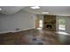 The living room features a stone fireplace, skylights, and multi-tone tile flooring at 4766 Jamerson Forest Cir, Marietta, GA 30066