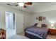 Bedroom with carpeted floors, neutral-colored walls, and a comfortable sleeping space with simple decor at 1641 Rocky Knoll Ln, Dacula, GA 30019